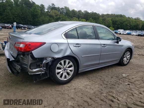 ✅ 2015 Subaru Legacy Premium • VIN: 4S3BNAD67F3067703 • Лот: 59162495. Опубликован ранее на Copart с пробегом 169 815 миль. Бесплатный доступ к архиву аукционных продаж из США и подробный отчёт об истории автомобиля на DreamBid. Изображение 3.