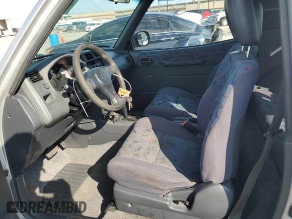 ✅ 1998 Toyota RAV4 • VIN: JT3XP10V1W0011615 • Lot: 66558255. Wystawiony na Copart z przebiegiem 199 400 mil. Bezpłatny archiwum sprzedaży aukcyjnych z USA i szczegółowy raport historii pojazdu na DreamBid. Zdjęcie 7.