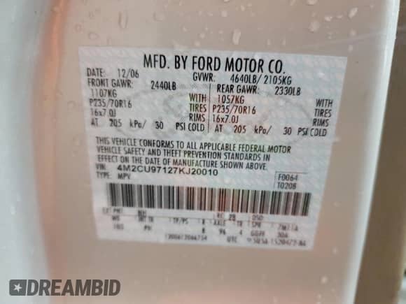 2007 Mercury Mariner Premier с VIN 4M2CU97127KJ20010, выставлен на аукционе Copart как лот 52123205 с пробегом 162 337 миль миль и Списание • Salvage title. История ставок и продаж доступна на DreamBid. Изображение 13.