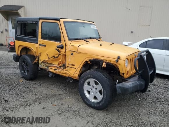 ✅ 2012 Jeep Wrangler Sport • VIN: 1C4AJWAG9CL147257 • Лот: 93436635. Опубликован ранее на Copart с пробегом 197 119 миль. Бесплатный доступ к архиву аукционных продаж из США и подробный отчёт об истории автомобиля на DreamBid. Изображение 4.