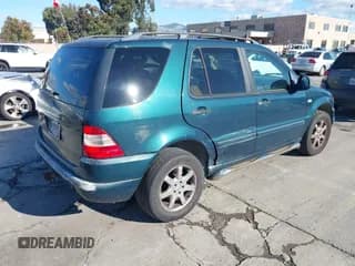 ✅ 1999 Mercedes-Benz M 320/430/500 • VIN: 4JGAB72E3XA123310 • Лот: 43727832. Опубликован ранее на IAAI с пробегом 152 382 миль. Бесплатный доступ к архиву аукционных продаж из США и подробный отчёт об истории автомобиля на DreamBid. Изображение 4.