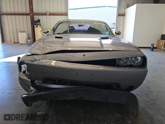✅ 2014 Dodge Challenger SXT • VIN: 2C3CDYAG2EH221277 • Lot: 83469934. Wystawiony na Copart z przebiegiem 164 499 mil. Bezpłatny archiwum sprzedaży aukcyjnych z USA i szczegółowy raport historii pojazdu na DreamBid. Zdjęcie 5.
