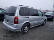 ✅ 1998 Oldsmobile Silhouette • VIN: 1GHDU03E7WD244480 • Lot: 87159404. Listed on Copart with 74,779 mi. Free auction sales archive from the USA and detailed vehicle history report at DreamBid. Image 3.