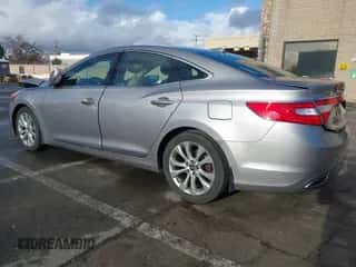 2013 Hyundai Azera z VIN KMHFG4JG4DA200108, wystawiony jako IAAI lot #41106201 z przebiegiem 79 920 mil mil oraz . Historia ofert i sprzedaży dostępna na DreamBid. Obrazek 3.