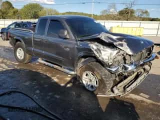 2003 Dodge Dakota SLT с VIN 1D7HG42N93S363166, выставлен на аукционе Copart как лот 72176534 с пробегом 189 834 миль миль и Списание • Salvage title. История ставок и продаж доступна на DreamBid. Изображение 4.