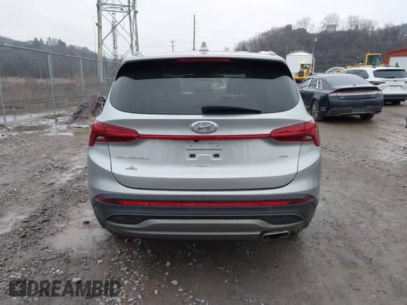 2022 Hyundai Santa Fe SE z VIN 5NMS1DAJ1NH400726, wystawiony jako IAAI lot #41680232 z przebiegiem 21 188 mil mil oraz . Historia ofert i sprzedaży dostępna na DreamBid. Obrazek 17.