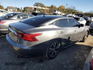 ✅ 2017 Nissan Maxima SL • VIN: 1N4AA6AP1HC395791 • Лот: 86774675. Опубликован ранее на Copart с пробегом Не указан. Бесплатный доступ к архиву аукционных продаж из США и подробный отчёт об истории автомобиля на DreamBid. Изображение 3.