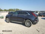 ✅ 2022 Cadillac XT4 FWD Premium Luxury • VIN: 1GYFZCR44NF151123 • Lot: 50312745. Listed on Copart with 46,820 mi. Free auction sales archive from the USA and detailed vehicle history report at DreamBid. Image 2.