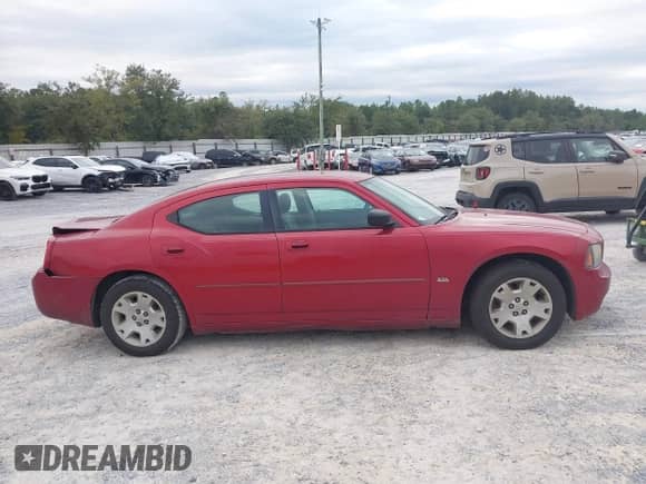 2006 Dodge Charger z VIN 2B3KA43G16H247989, wystawiony jako IAAI lot #43502229 z przebiegiem 161 986 mil mil oraz . Historia ofert i sprzedaży dostępna na DreamBid. Obrazek 13.