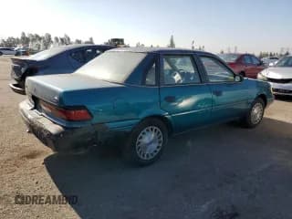 ✅ 1993 Ford Tempo GL • VIN: 2FAPP36X2PB168916 • Lot: 63911044. Wystawiony na Copart z przebiegiem 30 114 mil. Bezpłatny archiwum sprzedaży aukcyjnych z USA i szczegółowy raport historii pojazdu na DreamBid. Zdjęcie 3.