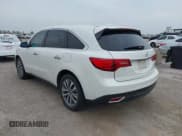 ✅ 2014 Acura MDX Technology • VIN: 5FRYD4H61EB016075 • Lot: 42073385. Listed on IAAI with 159,490 mi. Free auction sales archive from the USA and detailed vehicle history report at DreamBid. Image 3.