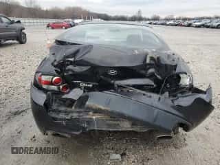 2007 Hyundai Tiburon GS z VIN KMHHM66D17U248440, wystawiony jako Copart lot #86642384 z przebiegiem 125 156 mil mil oraz Czysty tytuł • Clean title. Historia ofert i sprzedaży dostępna na DreamBid. Obrazek 6.