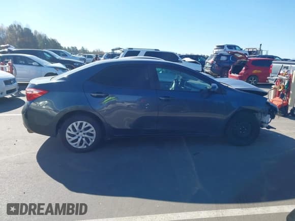 ✅ 2019 Toyota Corolla LE • VIN: 2T1BURHE7KC201310 • Lot: 43670254. Listed on IAAI with 146,506 mi. Free auction sales archive from the USA and detailed vehicle history report at DreamBid. Image 13.