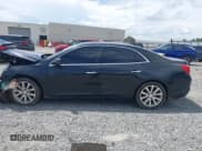 ✅ 2013 Chevrolet Malibu LTZ • VIN: 1G11H5SA6DF190026 • Lot: 42984401. Listed on IAAI with Not provided. Free auction sales archive from the USA and detailed vehicle history report at DreamBid. Image 14.