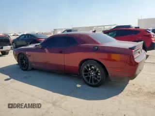 2022 Dodge Challenger R/T Scat Pack Widebody z VIN 2C3CDZFJ8NH212190, wystawiony jako Copart lot #69631525 z przebiegiem 31 214 mil mil oraz Czysty tytuł • Clean title. Historia ofert i sprzedaży dostępna na DreamBid. Obrazek 2.