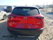 ✅ 2022 Mazda CX-30 S Premium • VIN: 3MVDMBDLXNM418896 • Lot: 43677405. Listed on IAAI with 29,689 mi. Free auction sales archive from the USA and detailed vehicle history report at DreamBid. Image 16.