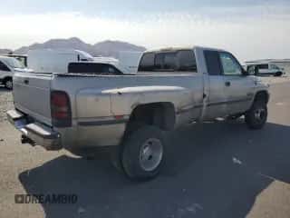 1999 Dodge 3500 with VIN 1B7MF3360XJ604685, listed as a Copart auction lot 65044415 with 319,634 mi miles and Salvage title. Bid and sale history available at DreamBid. Image 3.