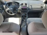 ✅ 2002 Mazda Protege DX • VIN: JM1BJ225320634626 • Lot: 84905245. Wystawiony na Copart z przebiegiem 178 114 mil. Bezpłatny archiwum sprzedaży aukcyjnych z USA i szczegółowy raport historii pojazdu na DreamBid. Zdjęcie 8.