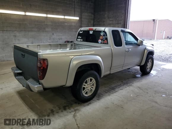 ✅ 2011 GMC Canyon • VIN: 1GTJ6MF93B8107709 • Лот: 76542044. Опубликован ранее на Copart с пробегом 89 127 миль. Бесплатный доступ к архиву аукционных продаж из США и подробный отчёт об истории автомобиля на DreamBid. Изображение 3.