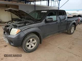 2012 Nissan Frontier SV with VIN 1N6AD0FV6CC415478, listed as a Copart auction lot 82284145 with 227,294 mi miles and Salvage title. Bid and sale history available at DreamBid. Image 1.