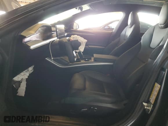 ✅ 2024 Tesla Model S Plaid • VIN: 5YJSA1E63RF534763 • Lot: 82261265. Listed on Copart with 24,837 mi. Free auction sales archive from the USA and detailed vehicle history report at DreamBid. Image 7.