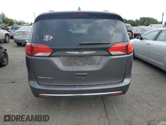 ✅ 2018 Chrysler Pacifica Touring L • VIN: 2C4RC1BG9JR124516 • Лот: 71738455. Опубликован ранее на Copart с пробегом 168 762 миль. Бесплатный доступ к архиву аукционных продаж из США и подробный отчёт об истории автомобиля на DreamBid. Изображение 6.