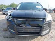 ✅ 2015 Ford Escape SE • VIN: 1FMCU9GX0FUC75583 • Lot: 42904718. Listed on IAAI with 169,482 mi. Free auction sales archive from the USA and detailed vehicle history report at DreamBid. Image 12.