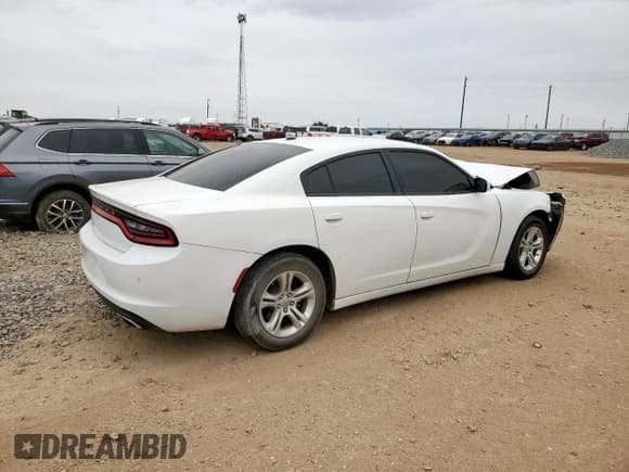 ✅ 2022 Dodge Charger SXT • VIN: 2C3CDXBG0NH152338 • Lot: 84049725. Listed on Copart with 57,291 mi. Free auction sales archive from the USA and detailed vehicle history report at DreamBid. Image 3.