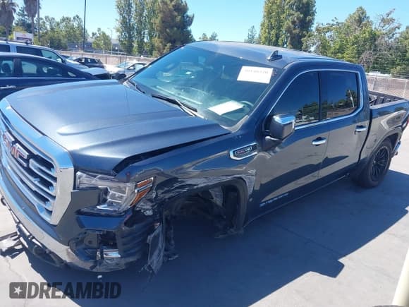 ✅ 2022 GMC Sierra 1500 SLT • VIN: 1GTU9DELONZ219903 • Lot: 40140320. Listed on IAAI with 57,019 mi. Free auction sales archive from the USA and detailed vehicle history report at DreamBid. Image 18.