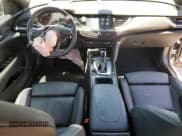 ✅ 2018 Buick Regal GS • VIN: W04GS6SS9J1122730 • Lot: 57366075. Listed on Copart with 95,034 mi. Free auction sales archive from the USA and detailed vehicle history report at DreamBid. Image 8.