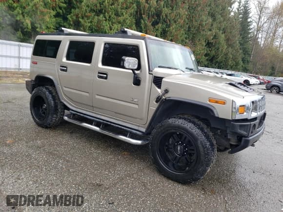 ✅ 2003 Hummer H2 • VIN: 5GRGN23U73H111109 • Lot: 76388144. Listed on Copart with 160,179 mi. Free auction sales archive from the USA and detailed vehicle history report at DreamBid. Image 4.