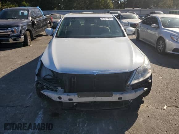 2011 Hyundai Genesis z VIN KMHGC4DF0BU126197, wystawiony jako Copart lot #77011234 z przebiegiem 171 348 mil mil oraz Szkoda całkowita • Salvage title. Historia ofert i sprzedaży dostępna na DreamBid. Obrazek 5.