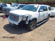 ✅ 2018 GMC Yukon XL Denali • VIN: 1GKS2HKJ5JR205080 • Lot: 43059317. Listed on IAAI with 129,808 mi. Free auction sales archive from the USA and detailed vehicle history report at DreamBid. Image 2.