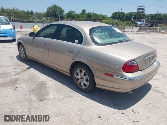✅ 2004 Jaguar S-Type • VIN: SAJEA01T94FN12064 • Лот: 41928836. Опубликован ранее на IAAI с пробегом 158 701 миль. Бесплатный доступ к архиву аукционных продаж из США и подробный отчёт об истории автомобиля на DreamBid. Изображение 3.