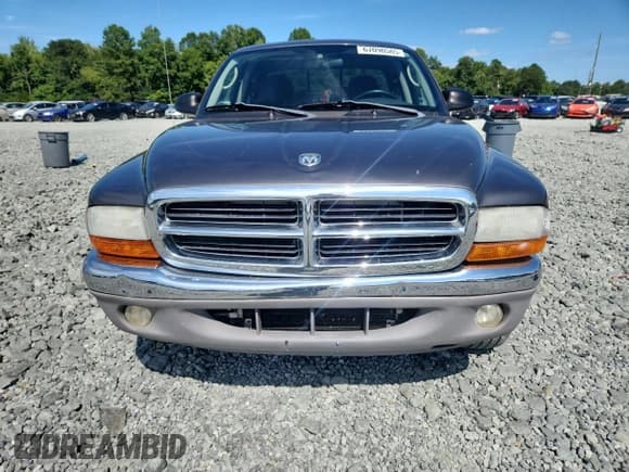✅ 2003 Dodge Dakota SLT • VIN: 1D7HL42N53S190029 • Lot: 67090505. Wystawiony na Copart z przebiegiem 129 629 mil. Bezpłatny archiwum sprzedaży aukcyjnych z USA i szczegółowy raport historii pojazdu na DreamBid. Zdjęcie 5.