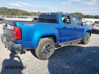 ✅ 2022 Chevrolet Colorado 4WD Z71 • VIN: 1GCGTDENXN1147977 • Лот: 75995264. Опубликован ранее на Copart с пробегом 26 184 миль. Бесплатный доступ к архиву аукционных продаж из США и подробный отчёт об истории автомобиля на DreamBid. Изображение 3.