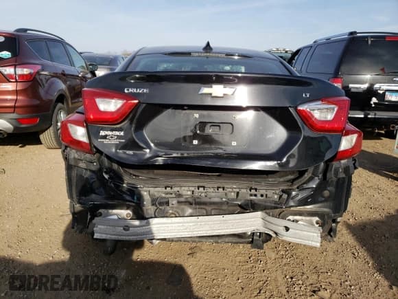 ✅ 2018 Chevrolet Cruze LT • VIN: 1G1BE5SM4J7100658 • Lot: 47923453. Listed on Copart with 48,161 mi. Free auction sales archive from the USA and detailed vehicle history report at DreamBid. Image 6.