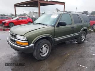✅ 2001 Chevrolet Blazer LT • VIN: 1GNDT13W212133371 • Lot: 41516111. Wystawiony na IAAI z przebiegiem 175 607 mil. Bezpłatny archiwum sprzedaży aukcyjnych z USA i szczegółowy raport historii pojazdu na DreamBid. Zdjęcie 2.