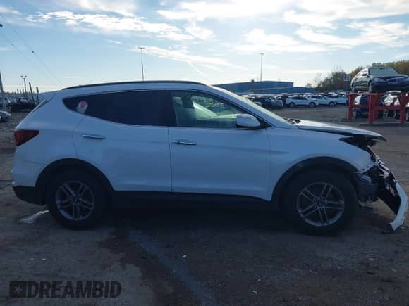 2018 Hyundai Santa Fe 2.4L z VIN 5NMZUDLB1JH097002, wystawiony jako IAAI lot #43473652 z przebiegiem 182 069 mil mil oraz . Historia ofert i sprzedaży dostępna na DreamBid. Obrazek 14.