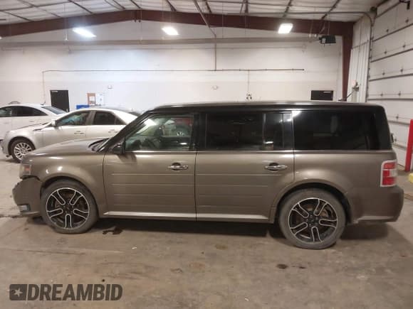 ✅ 2013 Ford Flex Limited • VIN: 2FMHK6DT5DBD14005 • Lot: 43771886. Wystawiony na IAAI z przebiegiem 136 577 mil. Bezpłatny archiwum sprzedaży aukcyjnych z USA i szczegółowy raport historii pojazdu na DreamBid. Zdjęcie 14.