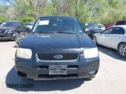 ✅ 2003 Ford Escape Limited • VIN: 1FMCU94103KB90251 • Lot: 42034006. Listed on IAAI with 225,566 mi. Free auction sales archive from the USA and detailed vehicle history report at DreamBid. Image 12.