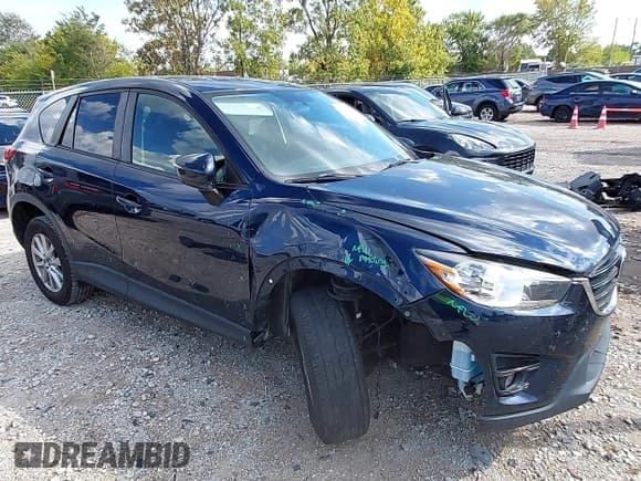✅ 2016 Mazda CX-5 Touring • VIN: JM3KE2CY7G0849891 • Lot: 43288504. Listed on IAAI with 133,906 mi. Free auction sales archive from the USA and detailed vehicle history report at DreamBid. Image 1.
