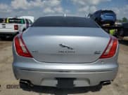 ✅ 2015 Jaguar XJ • VIN: SAJWJ1CD1F8V75232 • Lot: 57605685. Listed on Copart with 146,314 mi. Free auction sales archive from the USA and detailed vehicle history report at DreamBid. Image 6.