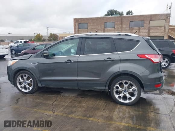 ✅ 2015 Ford Escape Titanium • VIN: 1FMCU0J93FUB49949 • Lot: 43715609. Listed on IAAI with 161,783 mi. Free auction sales archive from the USA and detailed vehicle history report at DreamBid. Image 14.