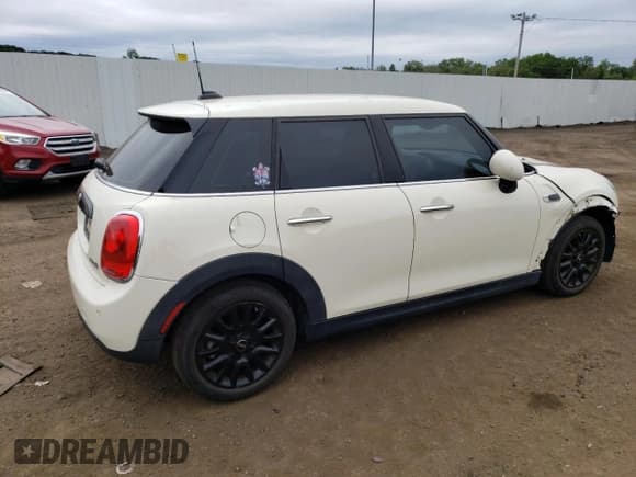 ✅ 2018 MINI Hardtop 4 Door Cooper • VIN: WMWXU1C5XJ2F80959 • Lot: 69179145. Listed on Copart with 44,023 mi. Free auction sales archive from the USA and detailed vehicle history report at DreamBid. Image 3.