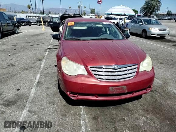✅ 2009 Chrysler Sebring LX • VIN: 1C3LC46B89N558199 • Lot: 64272255. Listed on Copart with 112,532 mi. Free auction sales archive from the USA and detailed vehicle history report at DreamBid. Image 13.