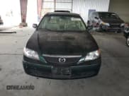 ✅ 2001 Mazda Protege DX • VIN: JM1BJ222210443431 • Лот: 80968155. Опубликован ранее на Copart с пробегом 104 598 миль. Бесплатный доступ к архиву аукционных продаж из США и подробный отчёт об истории автомобиля на DreamBid. Изображение 5.