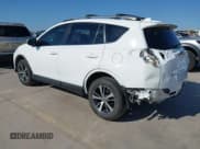 ✅ 2018 Toyota RAV4 XLE • VIN: JTMWFREV2JD132897 • Lot: 43310664. Listed on IAAI with 96,612 mi. Free auction sales archive from the USA and detailed vehicle history report at DreamBid. Image 3.