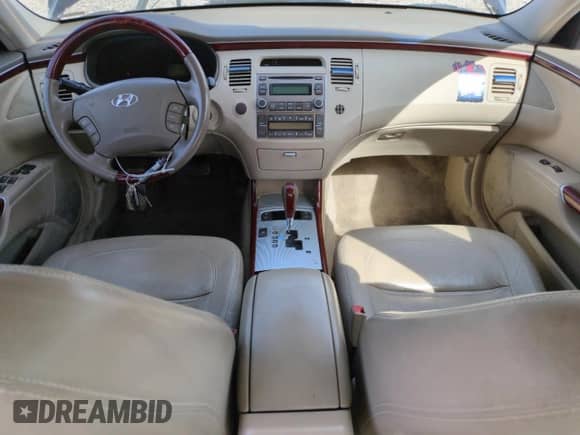 2006 Hyundai Azera SE с VIN KMHFC46F36A057974, выставлен на аукционе Copart как лот 52179905 с пробегом 142 391 миль миль и Списание • Salvage title. История ставок и продаж доступна на DreamBid. Изображение 8.