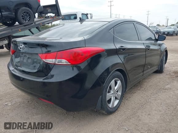 ✅ 2013 Hyundai Elantra GLS • VIN: 5NPDH4AE7DH319528 • Lot: 43861192. Listed on IAAI with 128,900 mi. Free auction sales archive from the USA and detailed vehicle history report at DreamBid. Image 4.